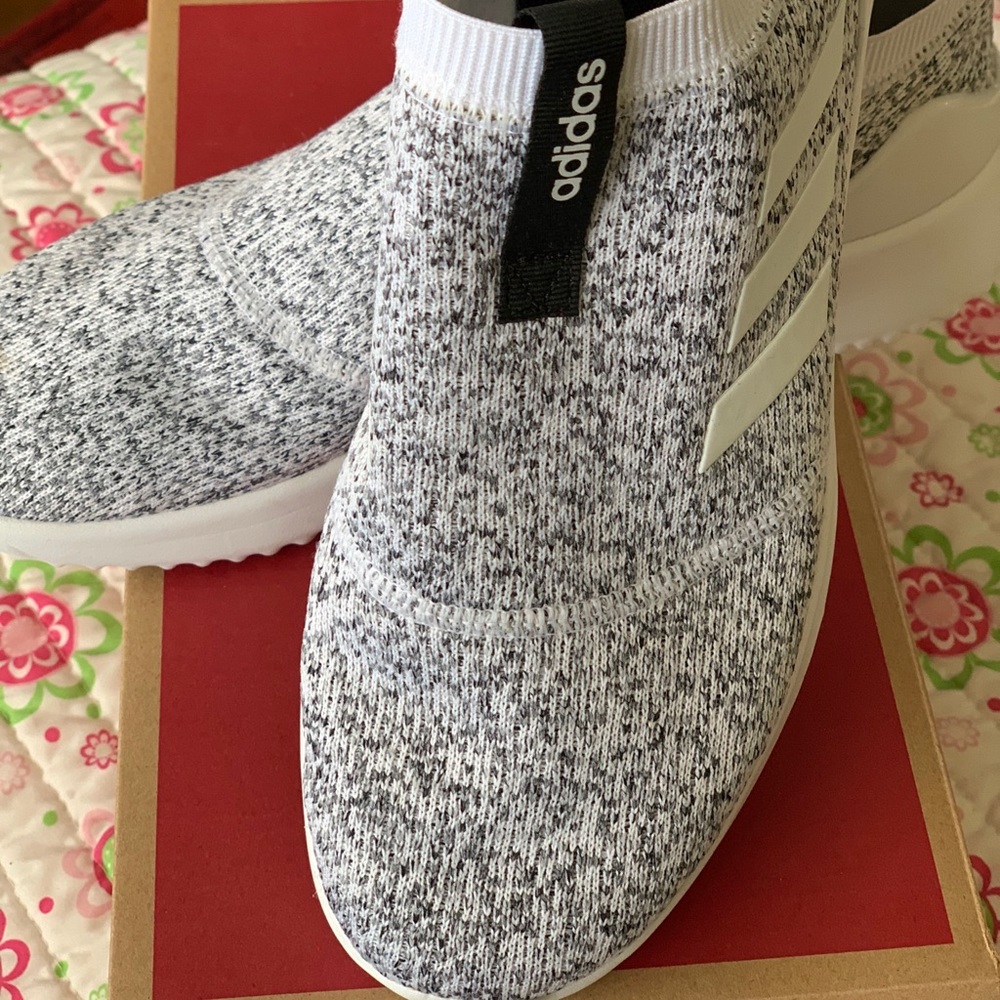 Addis’s black and white sneaker slip on